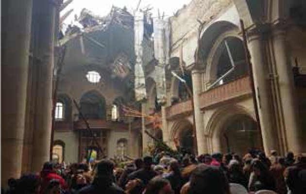 Den maronitiske kirke blev ramt af et bombenedslag i 2016. Det forhindrede dog ikke menigheden i at fejre jul. Foto: Bibelselskabet i Syrien