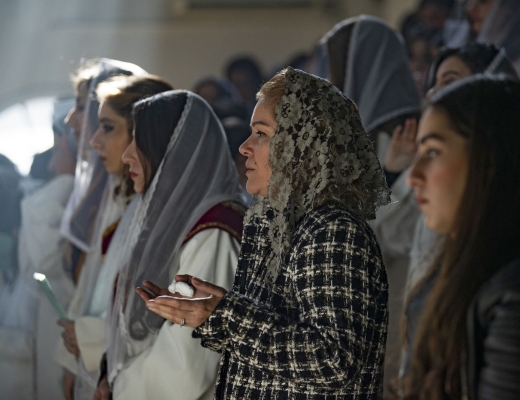 Kristne fejrer jul i en ortodoks menighed i det nordøstlige Syrien. Foto: Delil Souleiman/AFP/Ritzau Scanpix.